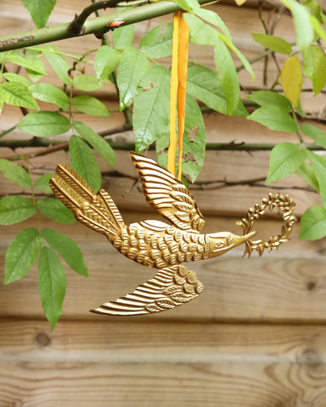 Golden Bird With Wreath